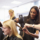 Teacher Helping Students Training To Become Hairdressers